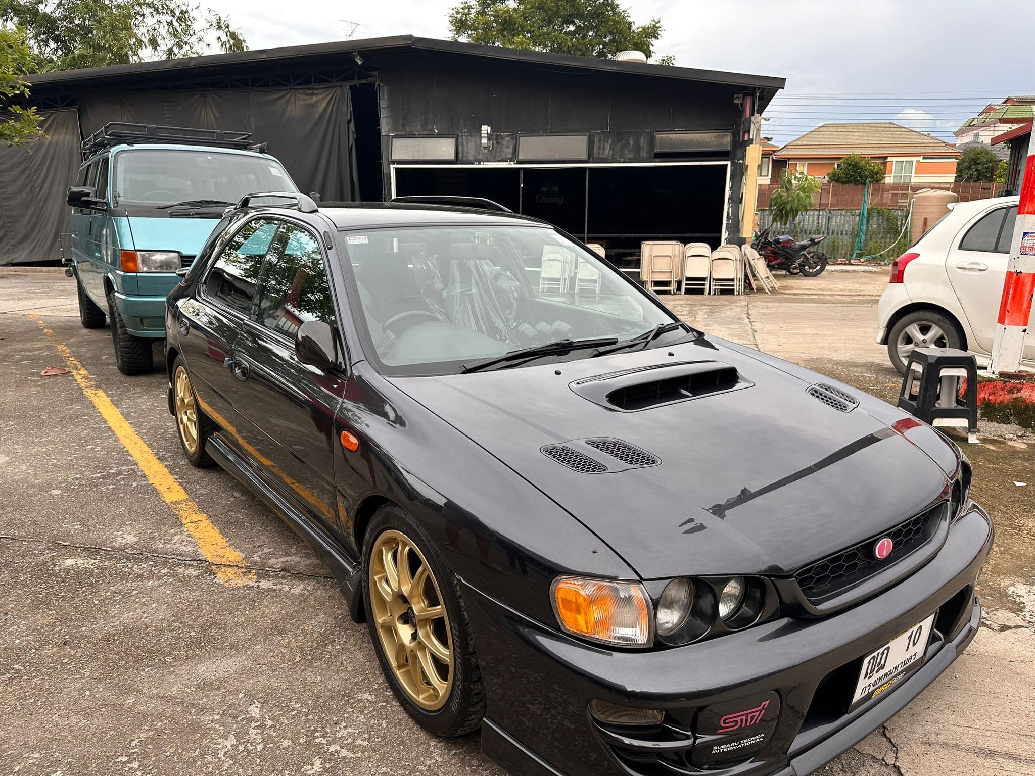 https://storage.googleapis.com/static_assets_iconicimports/dev_static/images/car_catalog/black_sti_1.jpg
