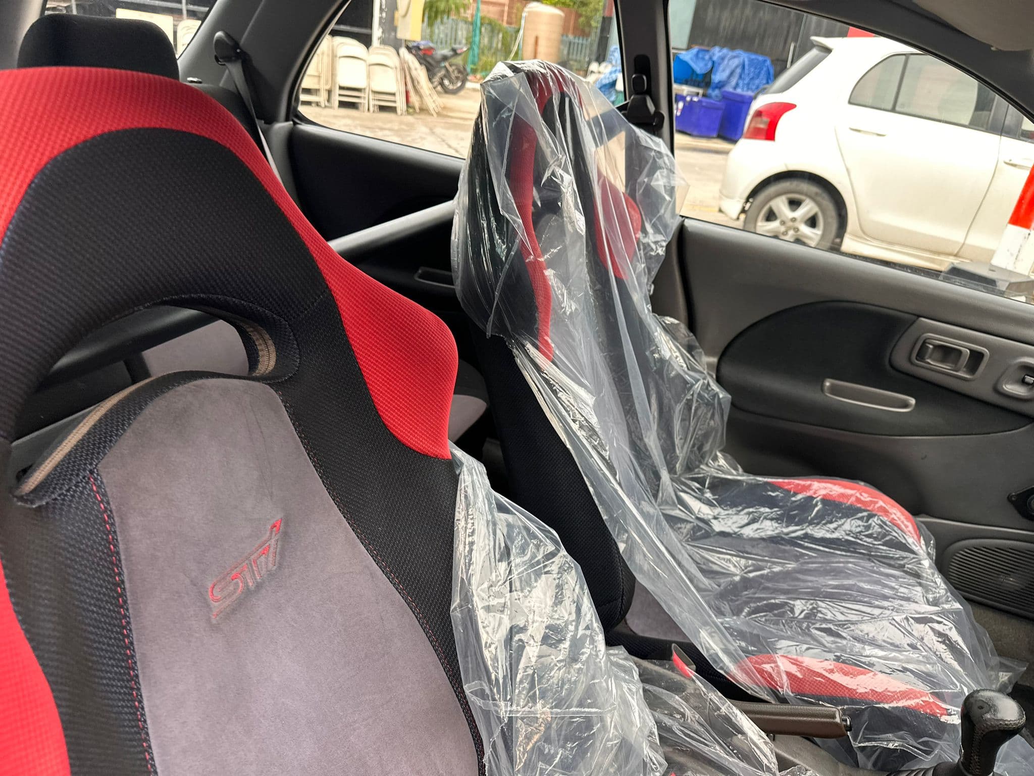 https://storage.googleapis.com/static_assets_iconicimports/dev_static/images/car_catalog/black_sti_2.jpg
