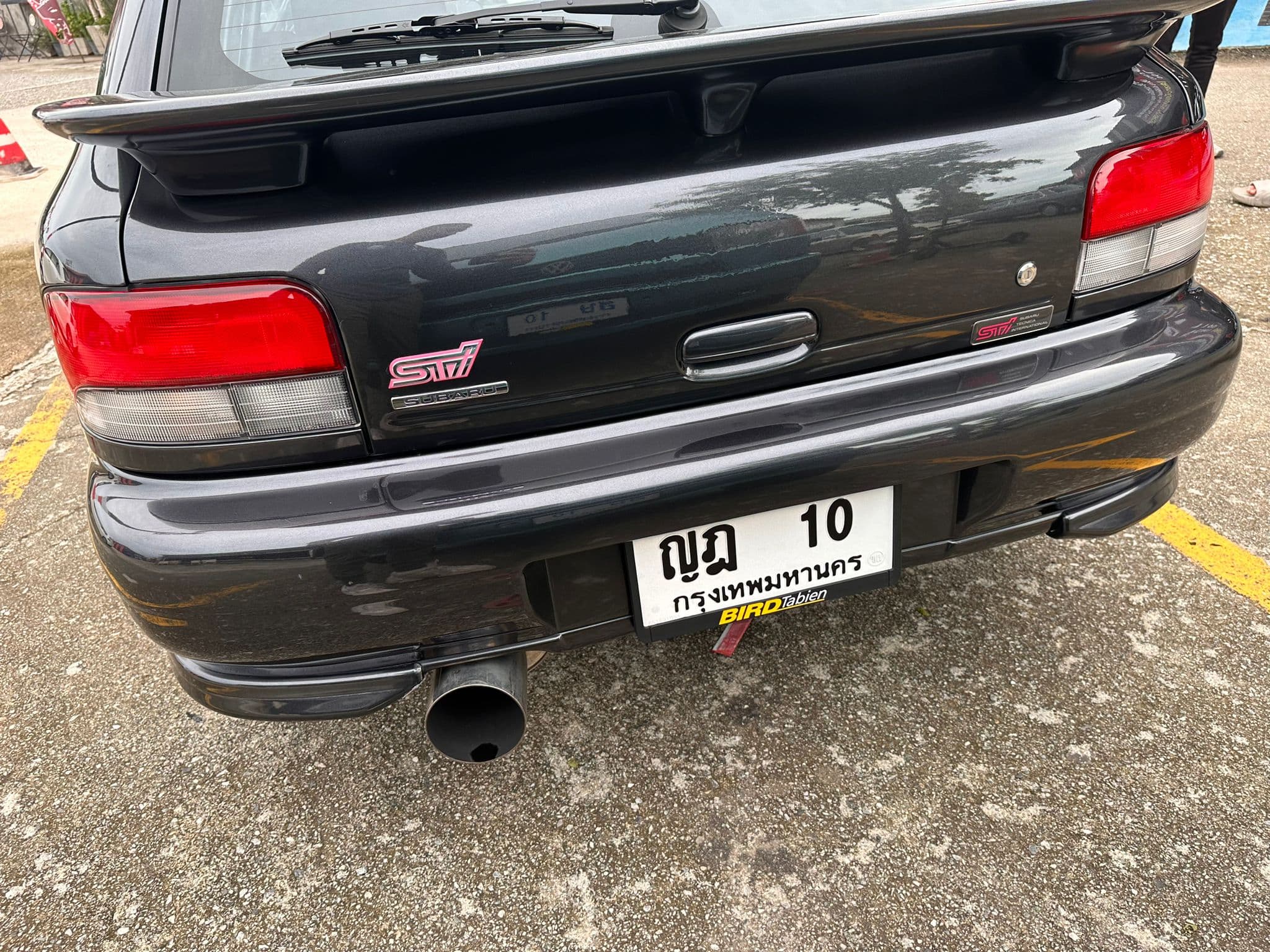 https://storage.googleapis.com/static_assets_iconicimports/dev_static/images/car_catalog/black_sti_4.jpg
